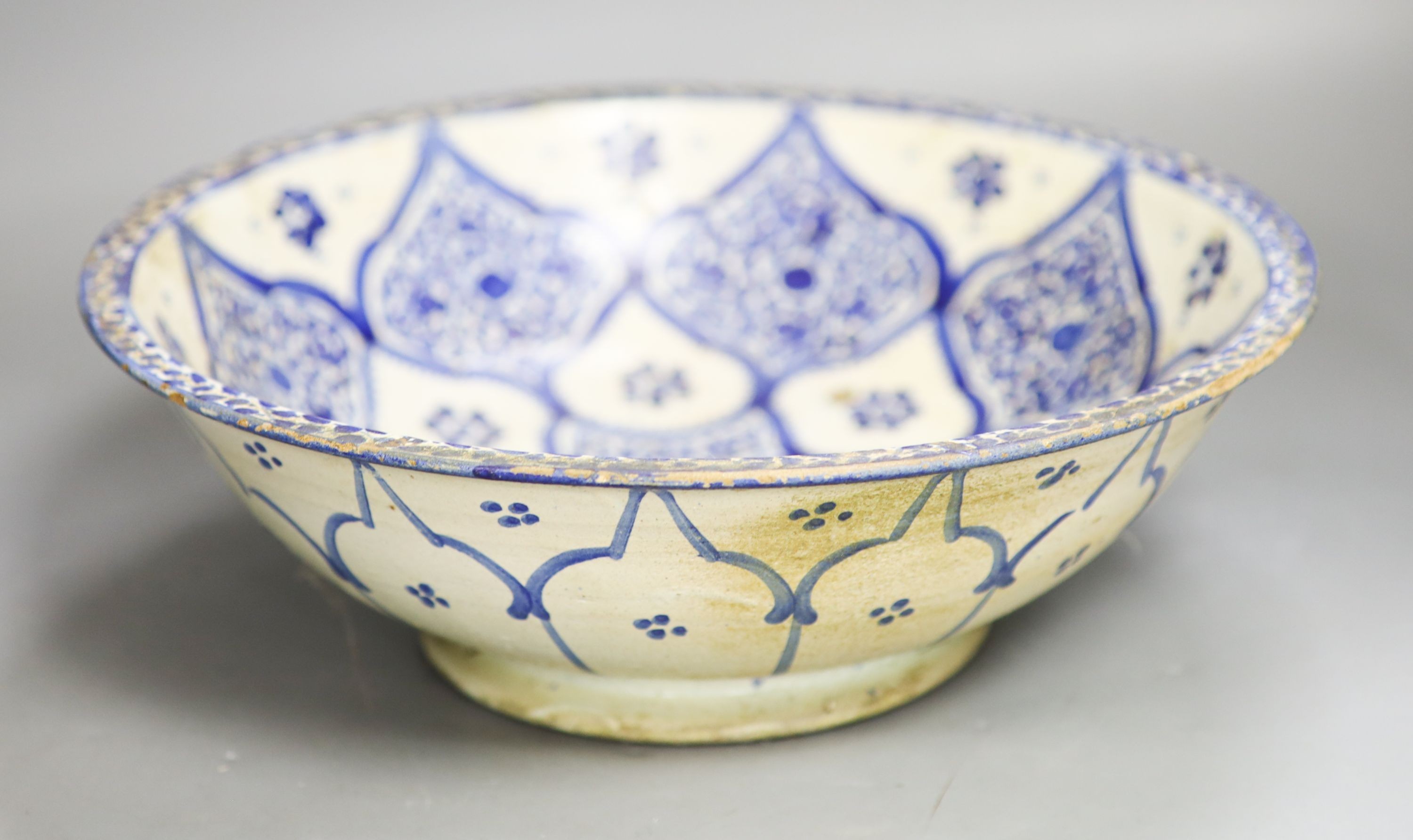 An Iznik style blue and white bowl 30cm